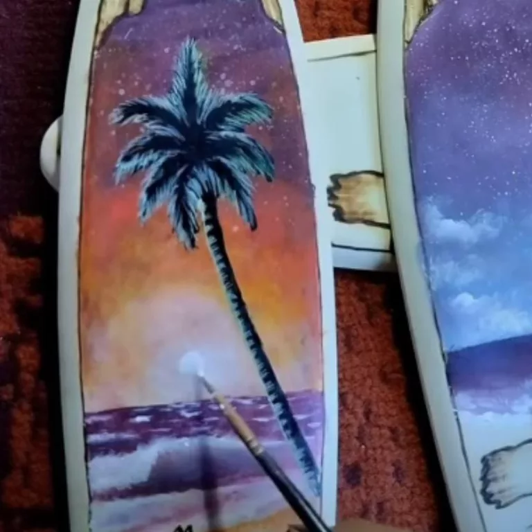 Sunset pyrography on a beach with coconut tree