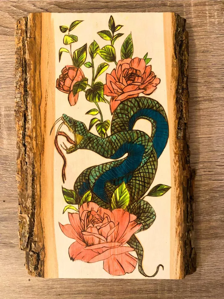 https://hobbydisiac.com/wp-content/uploads/2023/05/Colored-pyrography-of-a-snake-and-flowers-768x1024.webp