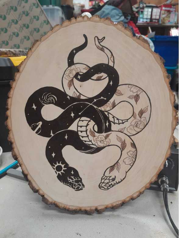 Pyrography snake without any scales by Jane Miller