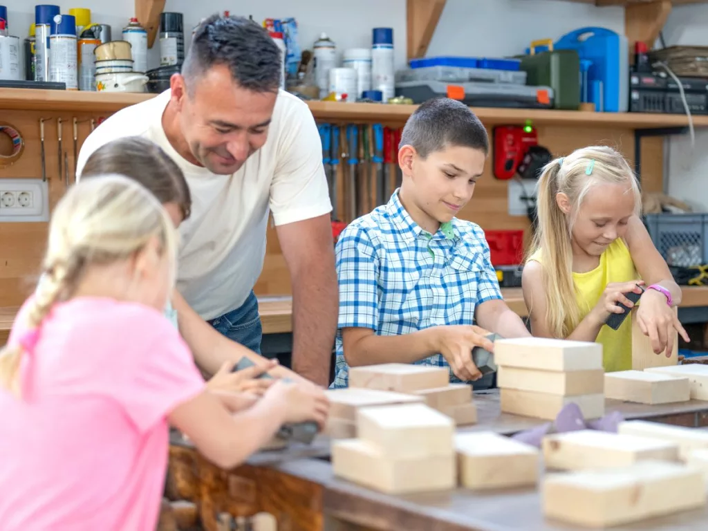 Kids are playing and woodworking